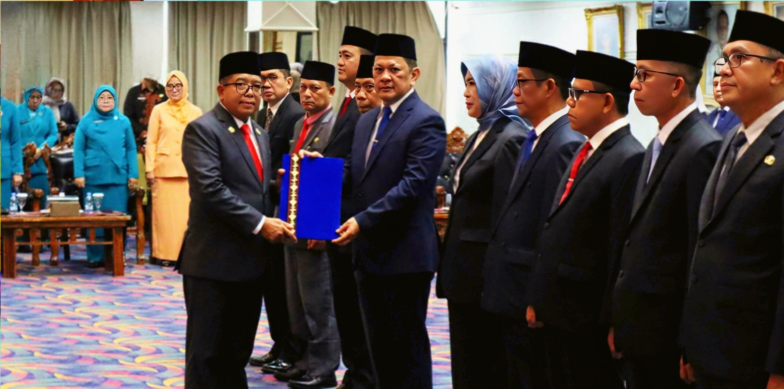a group of men standing in a room mv02zGG1GKFpN0g9 1 scaled