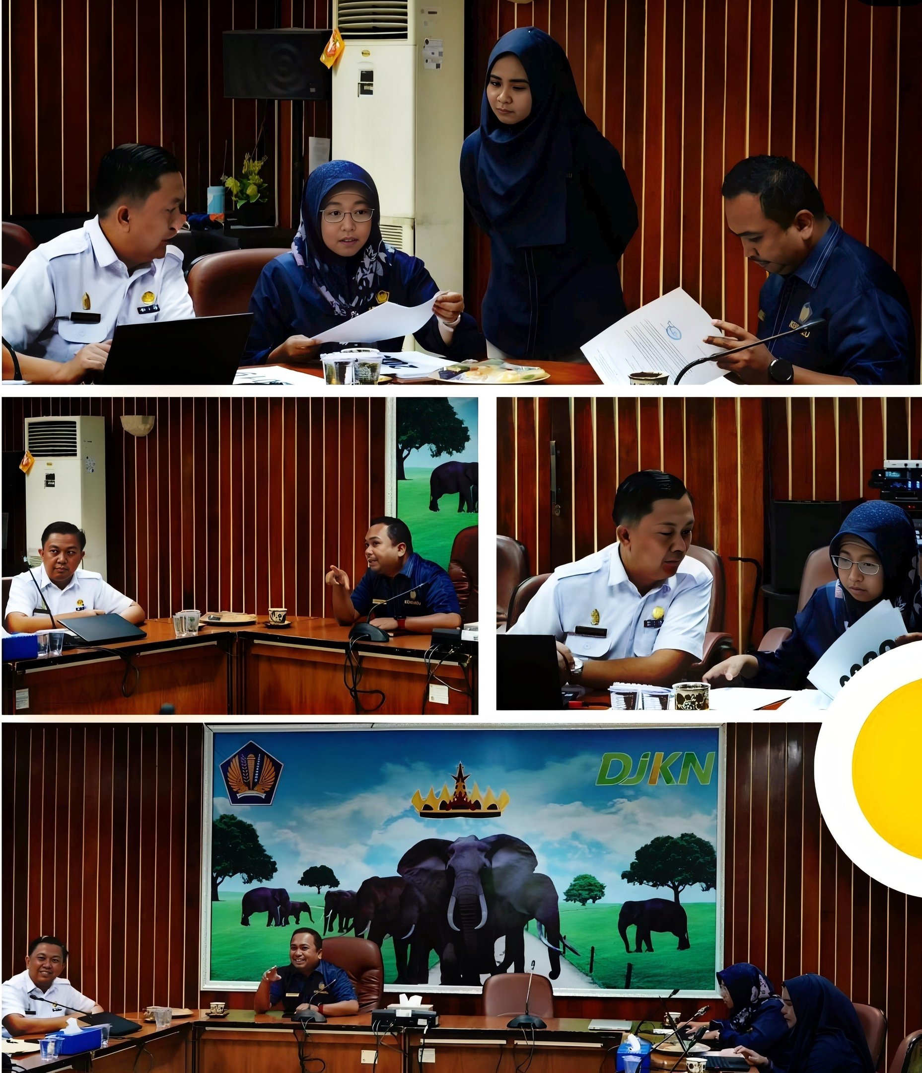 a group of people sitting at a table with a laptop